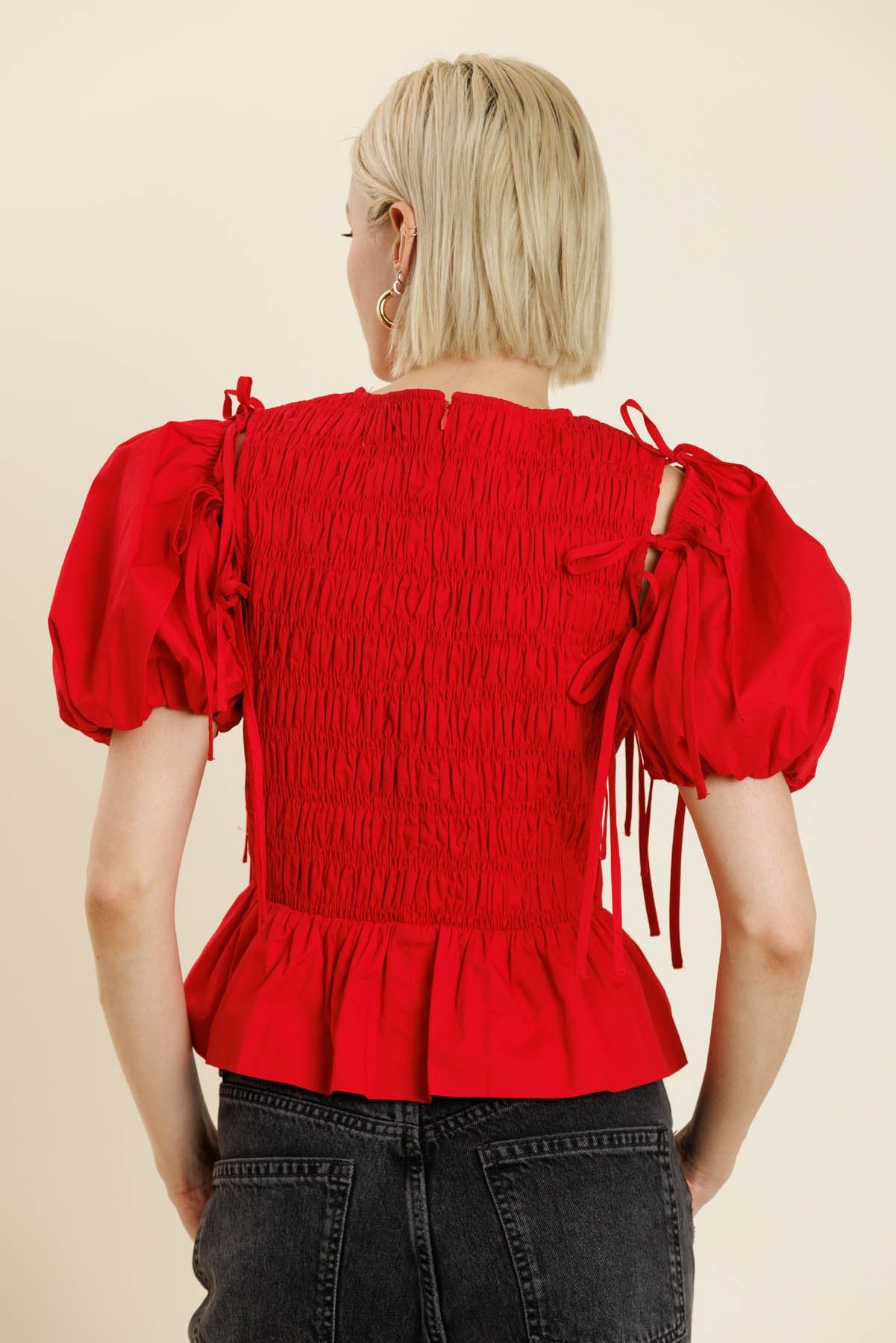 The Parks Peplum Top