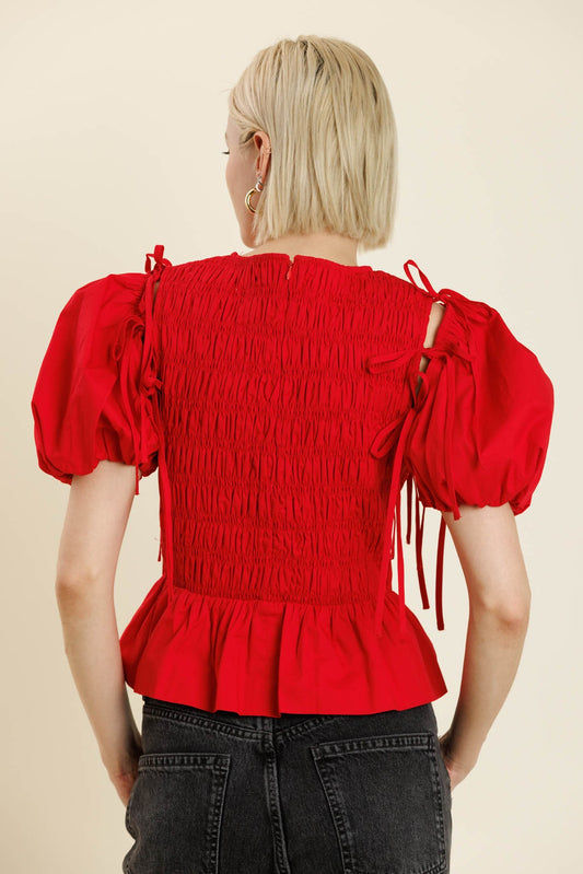 The Parks Peplum Top