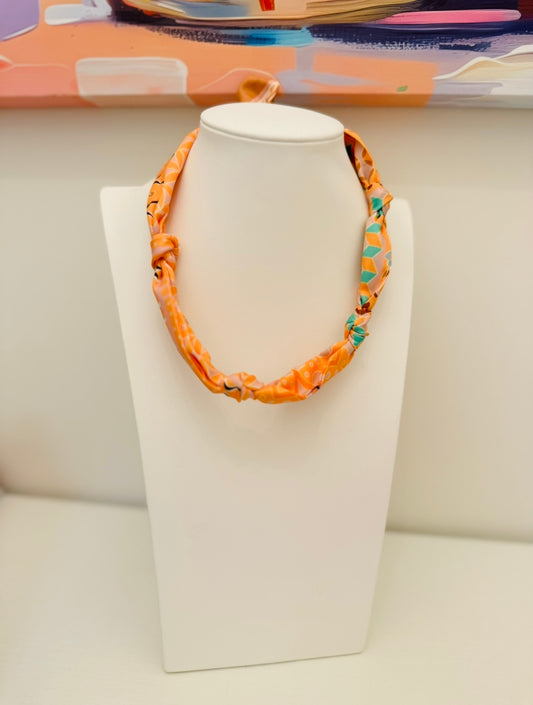 The Knotted Orange Geometric Scarf
